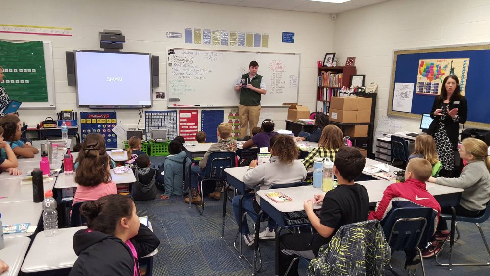 Excited students receive their dictionaries